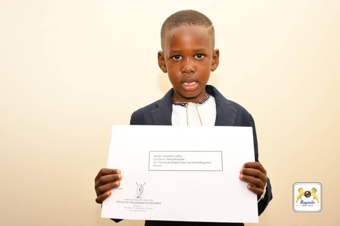 Dominic Luther Mubiru poses proudly with the letter of appreciation he received from the Kabaka Dominic Luther Mubiru poses proudly with the letter of appreciation he received from the Kabaka